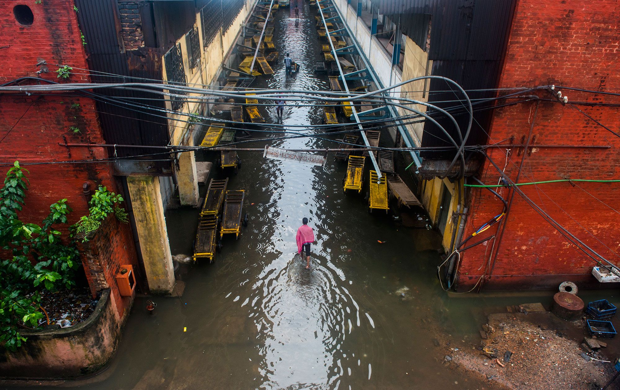 Heavy rains from a cyclone, flood the streets of Calcutta, a city quite used to flooding due to its proximity to the Ganges River.